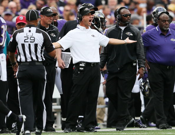 BALTIMORE, MD - SEPTEMBER 22: Head coach John Harbaugh of the Baltimore Ravens reacts to a call against the Houston Texans during the first half at M&T Bank Stadium on September 22, 2013 in Baltimore, Maryland.  (Photo by Rob Carr/Getty Images)