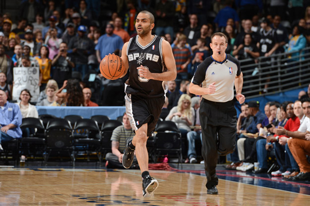 DENVER, CO - MARCH 28:  Tony Parker #9 of the San Antonio Spurs dribbles the ball against the Denver Nuggets on March 28, 2014 at the Pepsi Center in Denver, Colorado.