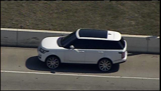 Michael Phelps 2014 Land Rover  is seen on the shoulder of I-95 hours after the Olympian swimmer was arrested Sept. 30 on  his second DUI.