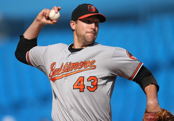 TORONTO, CANADA - SEPTEMBER 3: Jim Johnson #43 of the Baltimore Orioles delivers a pitch during MLB game action against the Toronto Blue Jays on September 3, 2012 at Rogers Centre in Toronto, Ontario, Canada. (Photo by Tom Szczerbowski/Getty Images)