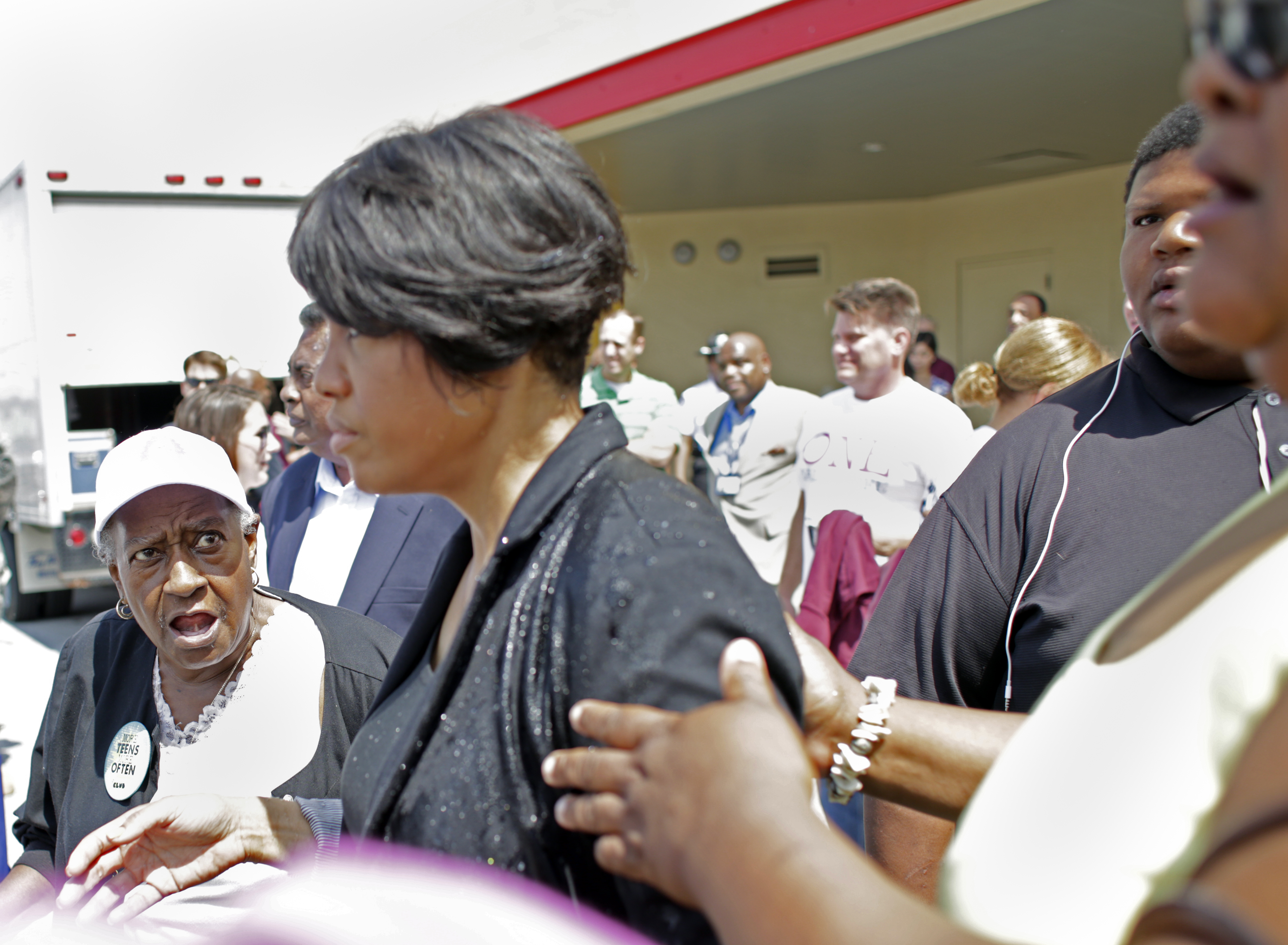 Baltimore, MD - 07/11/15 - Mayor Stephanie Rawlings-Blake has water dumped on her after speaking at the Mondawmin mall Tom Brenner / The Baltimore Sun.