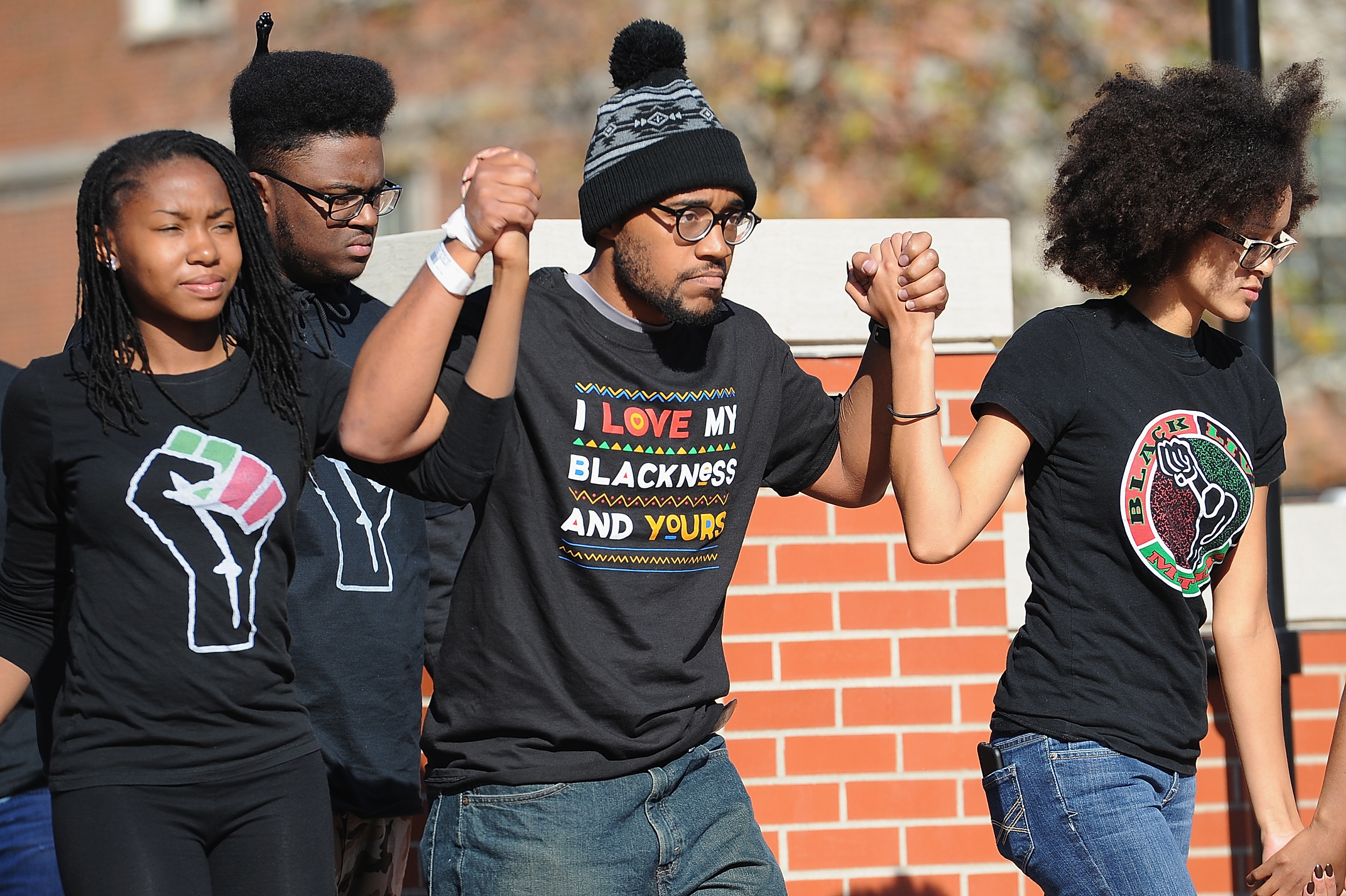 Jonathan Butler, a University of Missouri grad student who did a 7 day hunger strike is greeted by the crowd of students on the campus of University of Missouri - Columbia on November 9, 2015 in Columbia, Missouri. Students celebrate the resignation of University of Missouri System President Tim Wolfe amid allegations of racism. (Photo by Michael B. Thomas/Getty Images)